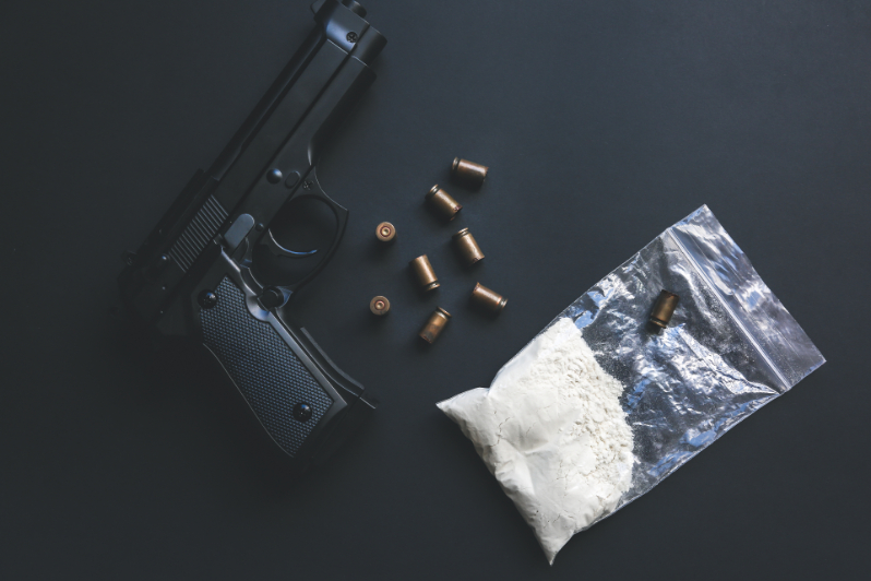 Firearm, ammo and bag of drugs. How a felony can affect ability to own a gun.