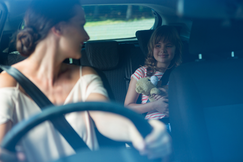 Intoxicated woman driving with a child in the vehicle.