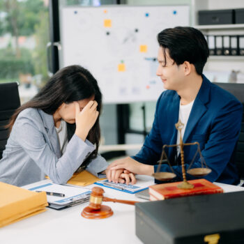 Judge gavel with scales of justice, Business and lawyer or counselor consulting and discussing contract papers
